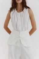 Blusa em Nylon com Basque Removível

Calça em Nylon Balloon