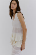 Blusa em Tricô Enrugado

Saia em Tricô Enrugado com Basque Removível