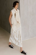 Colete em Jacquard com Textura Enrugada e Broche Removível

Saia em Jacquard com Textura Enrugada Bordada