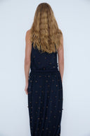 Blusa em Tricô Liso Bordado com Poás de Lã