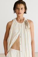 Calça em Jacquard com Textura Enrugada

Vestido em Jacquard com Textura Enrugada e Broche Removível